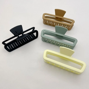 Matte finish square hair claws in black, camel, grey-green, and pale yellow set