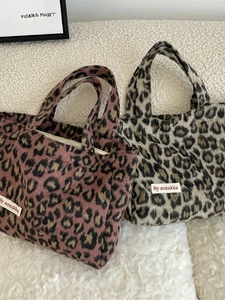 Furry leopard print tote bag with plush fabric and minimalist handle design in two colors