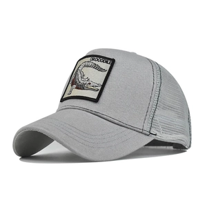 Light gray cotton mesh trucker hat featuring a realistic crocodile animal embroidery patch