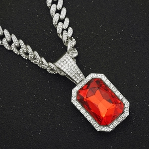 Men's hip-hop necklace with silver ruby pendant and zircon cuban chain in close-up