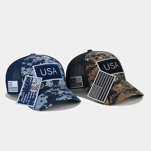 Detailed view of breathable mesh back and USA flag patches on camo tactical baseball caps