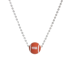 Detailed close-up of a brown American football pendant with silver stainless steel chain