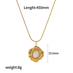 Elegant stainless steel necklace featuring a round translucent tiger eye stone pendant