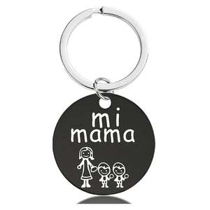 Detail of black metal keychain with mi mama text and mother child cartoon graphic