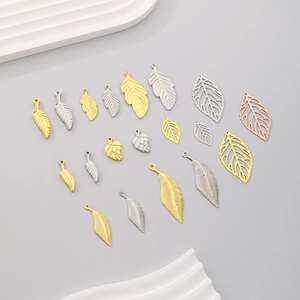 Assorted gold and silver hollow leaf charms for DIY jewelry making and handmade crafts