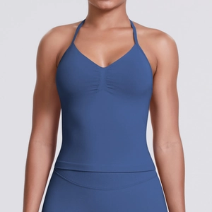 Detail of the ruched V-neck and halter strap on this blue compression sports bra
