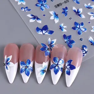 3D embossed blue lily and lily of the valley nail stickers on white French manicure