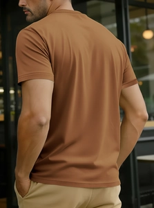 Men's cotton crewneck T-shirt in caramel brown showing smooth fabric texture from the back