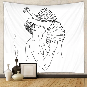 Detail of minimalist line art tapestry showing lovers hugging on white fabric