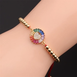 Adjustable golden bead bracelet with rainbow zircon heart pendant on red cord