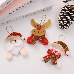 Three Christmas plush ornaments including Santa Claus, reindeer and snowman with plaid accents