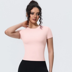 Slim fit light pink yoga t-shirt detail showing breathable fabric and round neckline