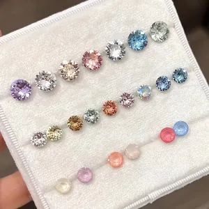 Sparkling multi-color round cut titanium steel screw back stud earrings set on velvet