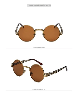 Detail view of steampunk round metal sunglasses with mechanical floral engraving