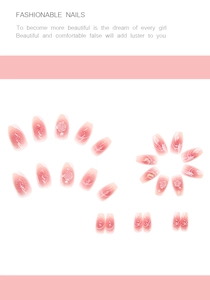 Detailed view of pink gradient press-on nails with 3D embossed camellias and pearls
