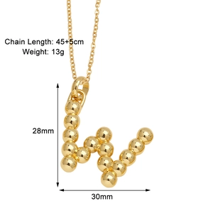 Detail view of gold letter W pendant with 45+5cm chain length and 13g weight info