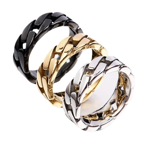 Detailed view of Cuban link chain rings in black, gold, and silver stainless steel