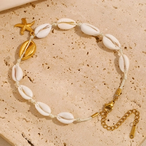 Bracelet de cheville doré 18K avec coquillage et étoile de mer style plage