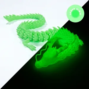 Detailed comparison of 3D printed articulated dragon in normal and green glow effect