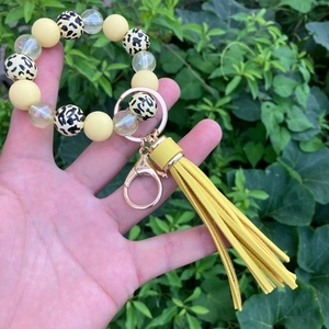 Luminous leopard print beaded wristlet keychain with yellow tassel for women