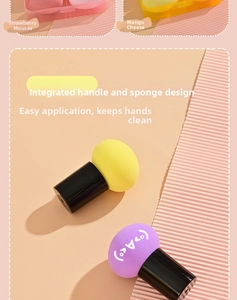 Detailed view of mushroom makeup sponge with handle and cute expression in storage box