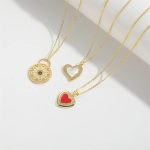 Golden necklace set with round moon-star, white heart, and red heart zircon pendants