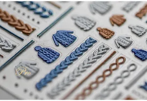 Detailed macro of 3D embossed knit texture nail art stickers with sweater patterns