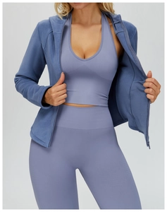Detailed close-up of Morandi blue fleece hooded jacket with seamless ribbed sports set