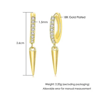 Gold plated hoop earrings with white zircon accents and hanging triangle cone charms