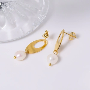 Elegant gold oval textured earrings with hanging white pearls for women