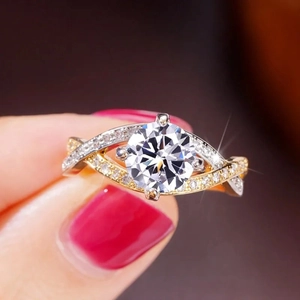 Classic four-prong round zircon ring with two-tone twisted pavé band for engagement