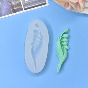 Lily of the valley silicone mold for fondant and resin art crafts on blue background