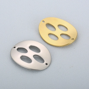 Pendentifs lotus ovales en acier inoxydable aux finitions or et argent