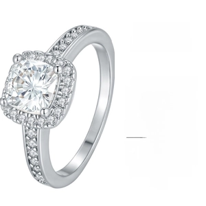 Macro view of cushion cut moissanite ring with halo setting and pavé diamond band