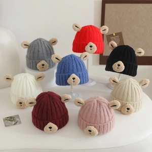 Cute kids knitted beanie with 3D bear ears and face in various winter colors