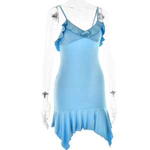 Detail view of the blue camisole dress featuring ruffled V-neck and rose decoration
