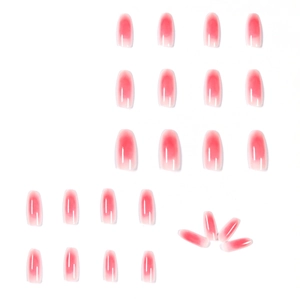 Pink blush gradient press-on nails in medium-short square oval shape with glossy finish