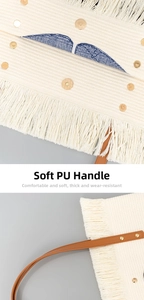 Close-up of magnetic buckle, soft PU handle and fringe detail on embroidered tote bag