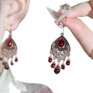 Vintage bronze drop tassel earrings with red resin stones and ethnic boho floral design