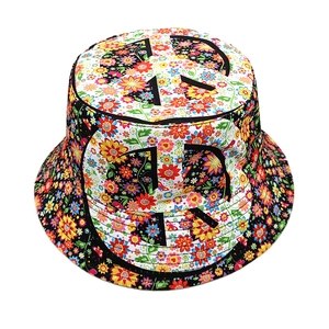 Floral bucket hat with geometric patterns and peace sign design in bohemian style