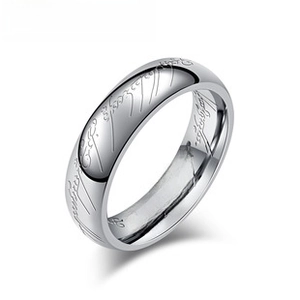 Detailed macro view of silver stainless steel ring featuring engraved Elvish inscriptions