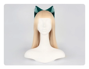 Detail of furry green gradient cat ears on a wig for Lolita cosplay and prop use