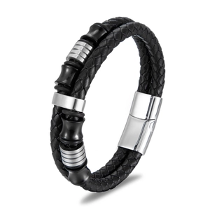 Men's double-layered black braided leather bracelet with silver magnetic clasp on white backdrop