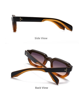 Detail of vintage thick frame sunglasses with amber pattern and gold star rivets