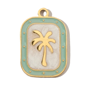 Macro detail of tropical gold coconut tree pendant with mint green enamel border