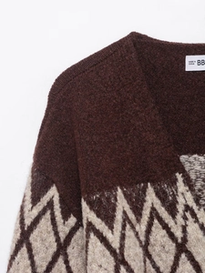 Detail of coffee knit sweater with argyle pattern on collar and soft texture