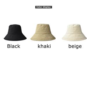 Detailed color display of cotton bucket hats in black, khaki, and beige shades