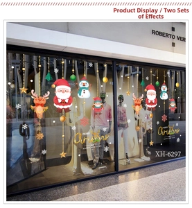 Detail of Christmas window stickers with Santa, reindeer and Merry Christmas lettering