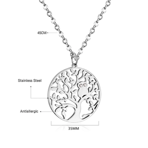 Detail of silver owl tree pendant in stainless steel with pink stone eyes and size marks