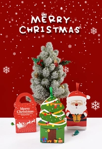 Three assorted Christmas candy gift boxes featuring Santa and tree designs in red and green